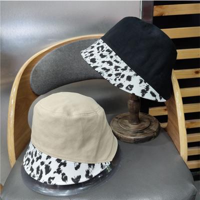 China 2021 New Fashion Leopard Print Fisherman Hat Sun Visor Hat Leopard Print Barred Short Male And Female Fisherman Hat for sale