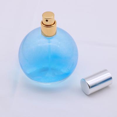 China Eco-friendly Spherical Glass 100mL Perfume Bottles Elegant French Style Round Ball Shape Clear Perfume Spray Bottle for sale