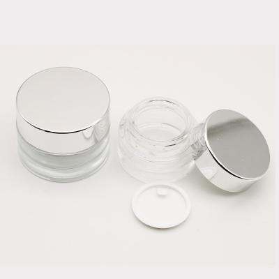 China Eco-friendly Wholesale 50mL 30g 50g Small Cosmetic Packaging Jars Empty Amber Glass Cream Jars With Clear Lids for sale