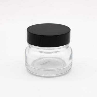 China Hot Selling Eco-friendly Clear Glass Cosmetic Glass Jar Cream Jar Wood Grain Lid 100mL Eco-friendly for sale