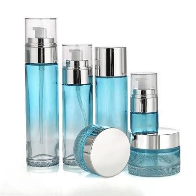 China Round 80ml 120ml 30g 50g Eco-friendly Round 80ml 120ml 30g 50g Skin Care Cream Lotion Glass Pump Set Cosmetic Packaging Bottle Eco-friendly Manufacturers Red Blue for sale