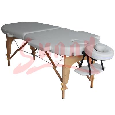 China Oval portable massage table 5cm foam massage table adjustable height massage tables massage table with face cushion for sale