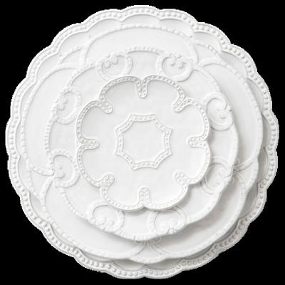 China Viable Manufacturers Supply Irregular Shape White Embossed 4pcs Porcelain Dinner Dishes Set for sale