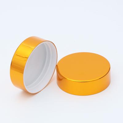 China Non Spill Gold High Quality Shiny Brush Aluminum Lid For Widemouth Cosmetic Plastic Jar for sale