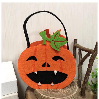 China Hot Selling Disposable Eco-friendly Pumpkin Shape Felt Basket For Halloween Decoration for sale