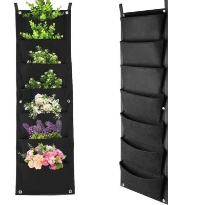 China Wholesale Breathable 7 Pocket Hanging Vertical Garden Wall Planter Felt To Grow Bag Garden Planting Bags for sale