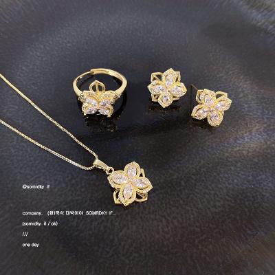 China FASHIONABLE Luxury Gold Plated Jewelry Set Clover Flower Adjustable Necklace Earrings Ring Accessories For Women for sale