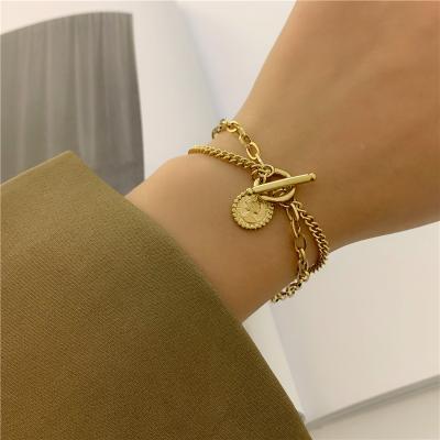 China Vintage TRENDY Women Layered Bangle Stainless Steel Gold Coin Bangle for sale