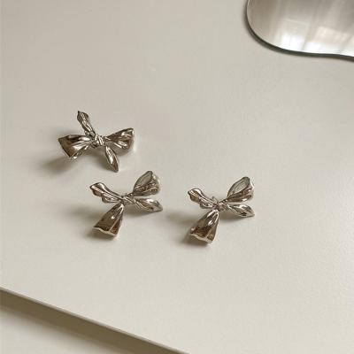 China 925 Needle Silver TRENDY Fashion Arc-knot Butterfly Earring Irregular Stud Earring for sale