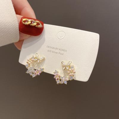 China FASHIONABLE Korean Silver Stud Earrings Flower Mail Style 925 Small Butterfly Circle Earrings For Women for sale