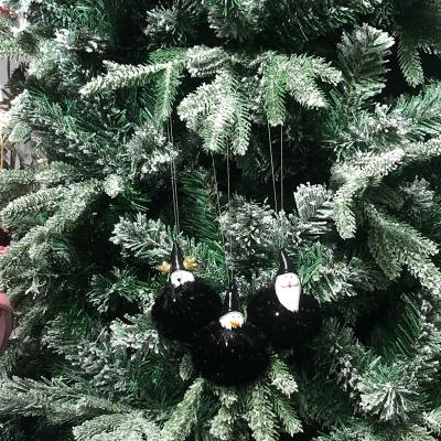 China 2021 Holiday Children's New Year Decoration Plush Whole Black Ball Resin Christmas World Party Gifts for sale