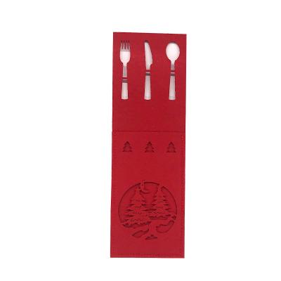 China Overall Christmas New Year knife and fork bag family party table decoration table take care pine for sale