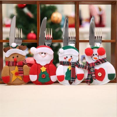 China The overall Christmas decorations restaurant hotel decorates the new non-woven older creative snowman knife and fork bag tableware set for sale