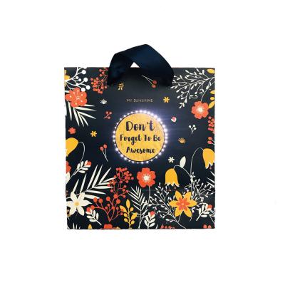 China Recyclable LED Light Gift Bags Custom Printed Paper Bag With Your Own Logo For Shopping for sale