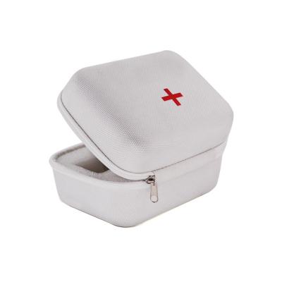 China Hard Shell Home Care Medical Equipment Case EVA Hard Shell Mini First Aid Kit Shockproof Waterproof Dustproof Custom Case for sale