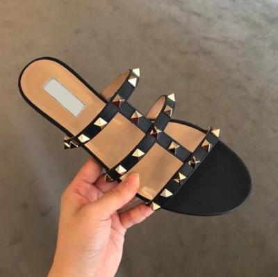 China Fashion Trend Summer Slippers Belt Buckle Slides Real Leather Solid Color Sandal Women Flat Slippers Flip Flops Lady Shoes Summer for sale