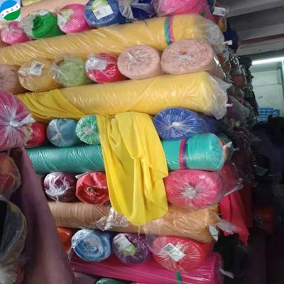 China Anti Pill Batch Bubble Plain Dyed Tube Woven Polyester 0.3kg Stock Fabric Ready Goods for sale