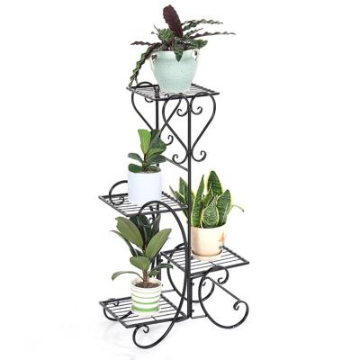 China Good quality modern container storage black metal flower pot rack floral stand with wholesale price for sale