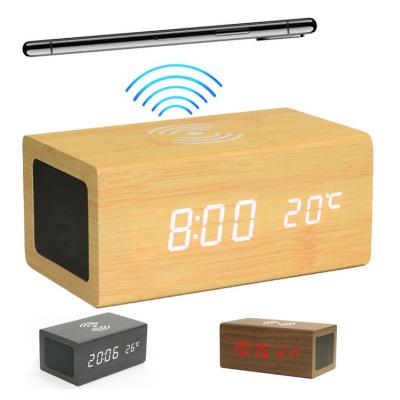 China New Fashion Wooden Speaker Smart Alarm Clock Wireless Charging Wooden Clock By Radio for sale