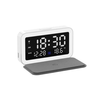 China 2021 New Arrivals 15w New Arrivals Wireless Phone Alarm Clock Folding Night Light LED Wireless Charging Multifunctional Alarm Clock Radio Trending Alarm Clock for sale