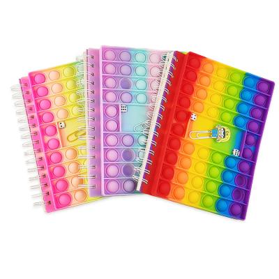 China Fashionable Hot Amazon Press Hole Rainbow Silicone Cover Decompression Coil Book Bubble Notebook for sale