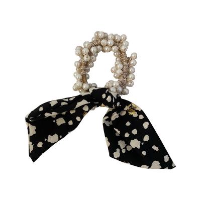 China A elastic band from Japan and new Korean style 2021 retro black and white short hair bow ribbon cow grain pearl cowhide for sale