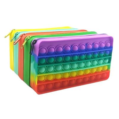 China 2022 New Simple Gift Push Pen Storage Bag Silicone Noise Bubble Bubble To Toy Kids Silicone Stress Relief Sensory Pencil Case for sale