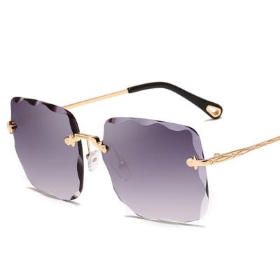 China Fashion Sunglasses Irregular Repand Lenses Fit Frameless Sun Glasses Luxury Color Rimless Sunglasses for sale