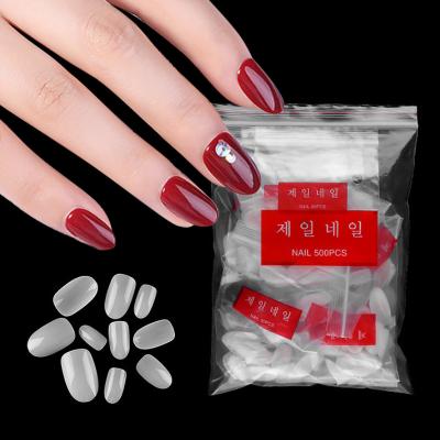 China 500pcs Fashion Full Cover False Nail Clear Natural Short Oval Nails Ultra Flexible UV Gel Tips DIY Professional Design TOOL for sale