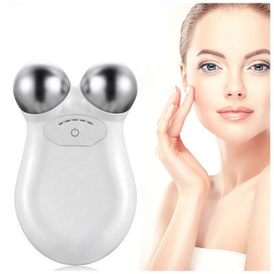 China Skin Care Tool EMS Ion Microcurrent V-Shape Device Healthy Skin Tightening Massager Roller Micro Current Facial Lifting Face Toning Device for sale