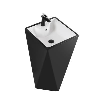 China easy clean & soft & Smooth factory supply a new type of table basin vertical ceramic black porcelain integrated vertical bathroom washbasin sink for sale