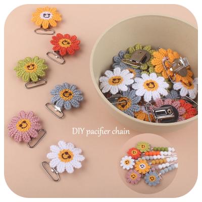 China Soothing Baby Teething Pain Nursery Baby DIY Product Handmade Metal Sunflower Hook Anti Dummy Drop Pacifier Clips for sale