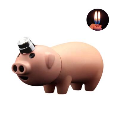 China Fashion and novelty creative gas flame funny piggy pink lighter, wholesale fire cute double pig refillable gas lighter for promotion for sale