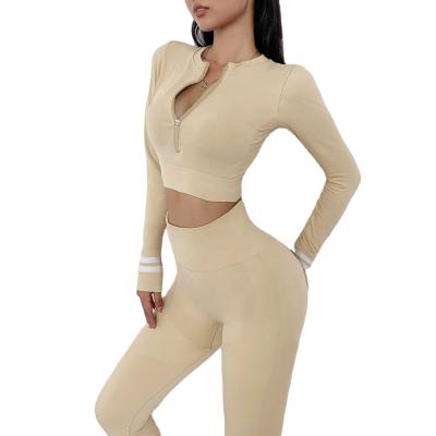 China Seamless Zipper Sportswear Long Sleeve Leggings Gym Fitness Breathable Wholesale Yoga Set for sale