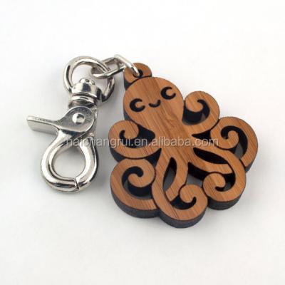 China Wooden Octopus Form Bamboo Key Chain Natural Bamboo Color Poly Bag for sale