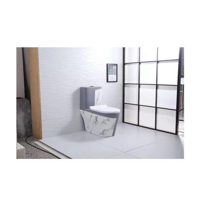 China Hot Selling Double-Flow Ceramic Commode 4.5 Liter Washdown Rimless One-Piece Toilet for sale