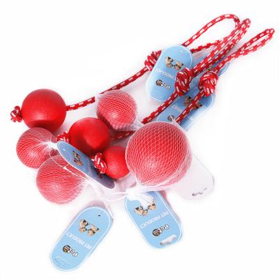 China Viable Good Prices Dog Training Ball Rope Reward Bite Ball Solid Rubber Non Bad Pet Toys for sale