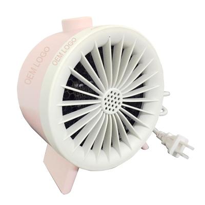 China 2021 Amazon Hot Nordic Winter Overheating Desktop Electric Fan Protective Heater Warm Air Blower for sale