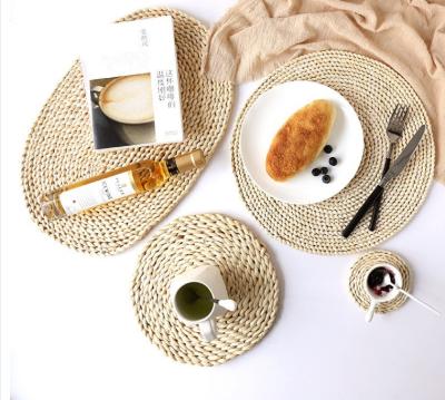 China Graceful Washable Woven Round PP Rattan Viable Woven Place Mats Tray Placemats Round for sale