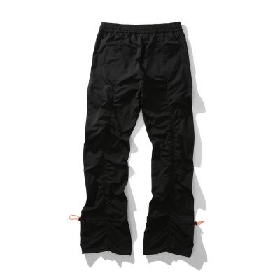 China American Fashionable Custom Brand QUICK DRY Flared Pleated Drawstring Design Trousers Men Casual Pants for sale