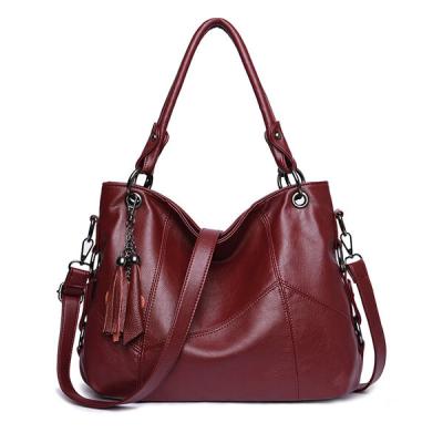 China Zipper Closure Tassel Plaid Handbag Genuine Leather Pendant Cross - Body Bag For Women Fashion Handbag for sale