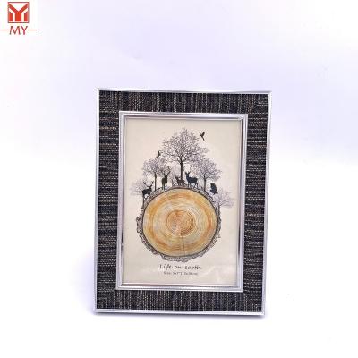 China Hot sale environmental friendly light weight design photo frame black and white granular embossed plastic picture frame for decoration for sale