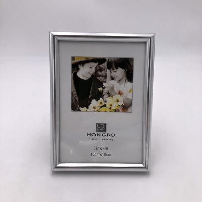 China Environmental Friendly Silver PVC Photo Frames Customizable Easy Stick Mini Plastic Picture Frame Mini Easy Change for sale