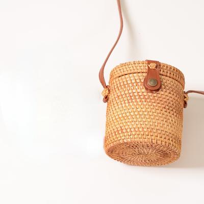 China Women's No Rattan Bucket Handmade Mini Bag Woven Leather Buckle Bag for sale