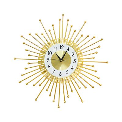 China New Style Antique Gold Clock Decoration Room Sun Design Iron Luxury Modern Hanging Wall Clock for sale