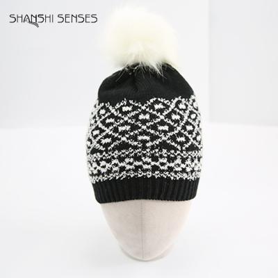 China COMMON ladies knitted adult winter bulk pom pom beanie hats from gold supplier for sale