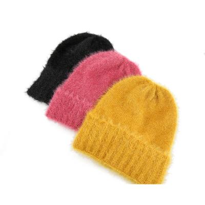 China JOINT Patterns Fur Hand Beanie Custom Black Knitted Winter Hat for sale