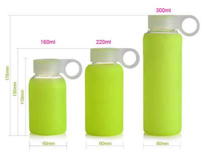 China Silicone Sleeve Reusable Glass Water Bottles With Compression Molding for sale