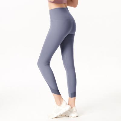 China 2022 New High Elastic Waist Stretch Polyester Spandex Gaiters Girl Wear Anti-UV Solid Skinny Yoga Pants for sale