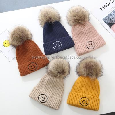 China COMMON 2022 Winter Keep Beanie Baby Kids Wool Smile Warm Face Knitted Hat Bow Beanies Removable Pompom for sale